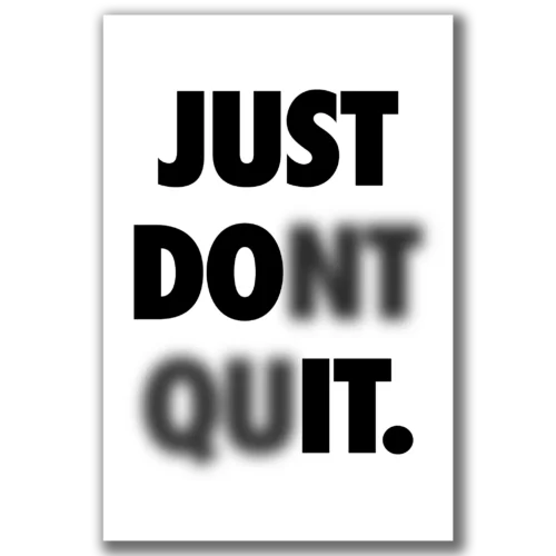 תמונת קנבס שחור לבן עם הכיתוב 'Just Don't Quit' בטיפוגרפיה מודרנית.